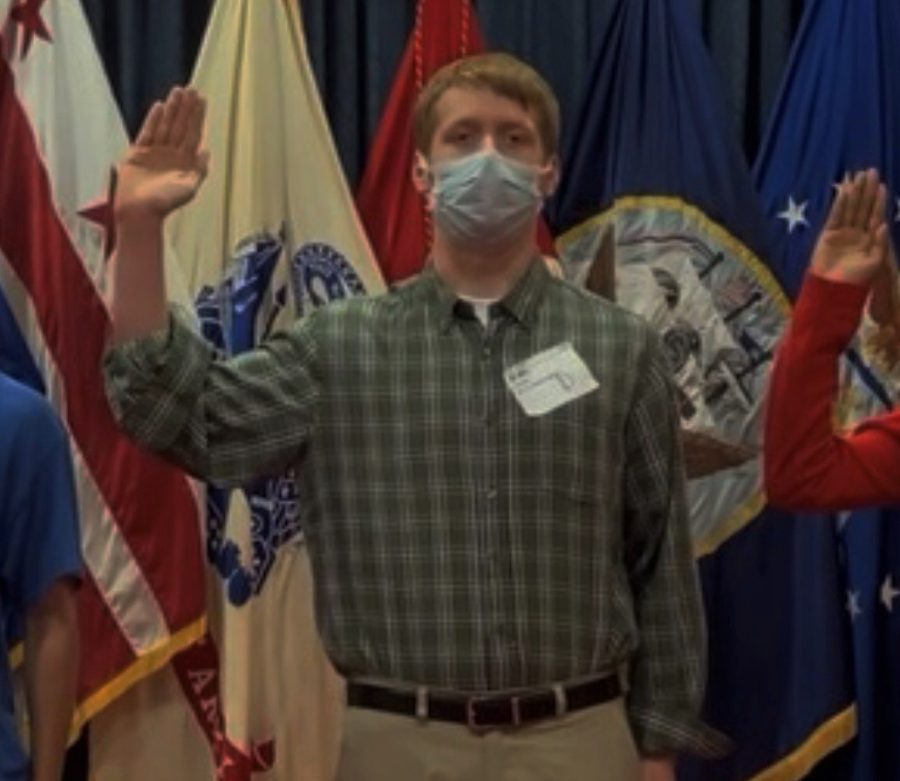 Kevin Cropp is sworn into the U.S. Military.