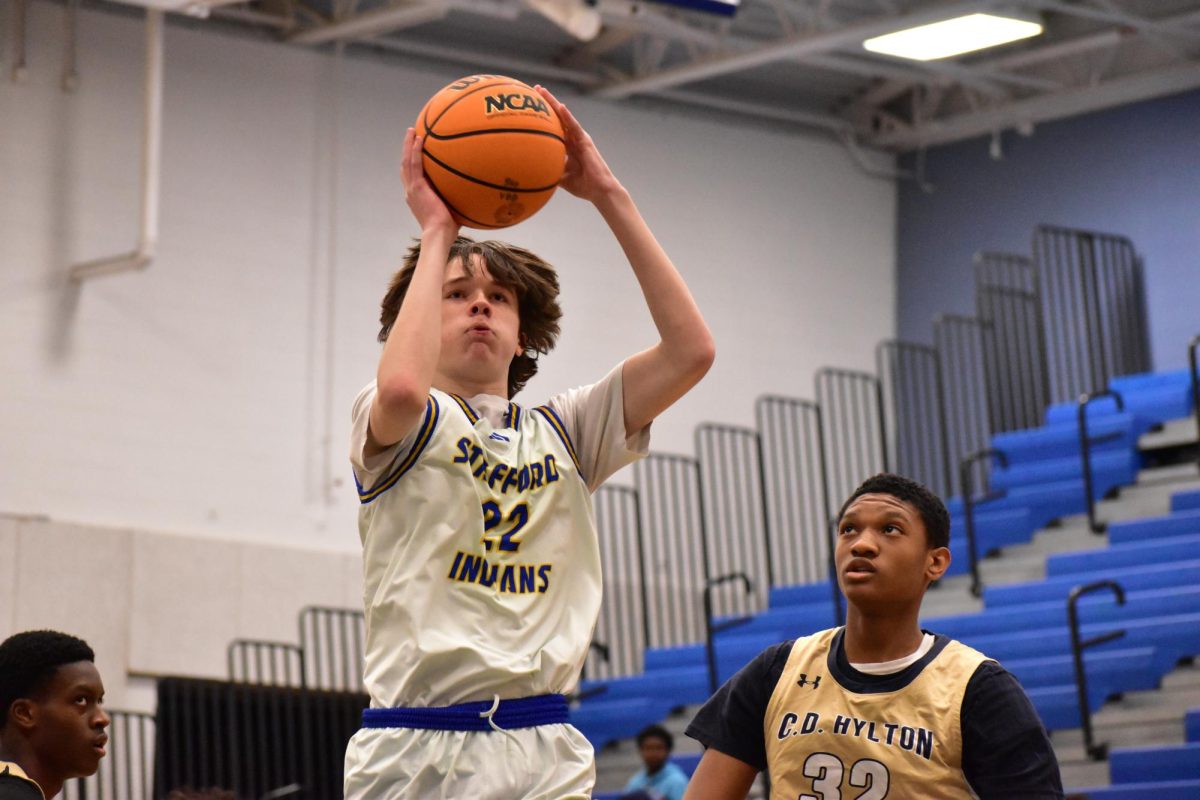 Preston wright takes an early shot against CD Hylton on a game they later won on December 4th