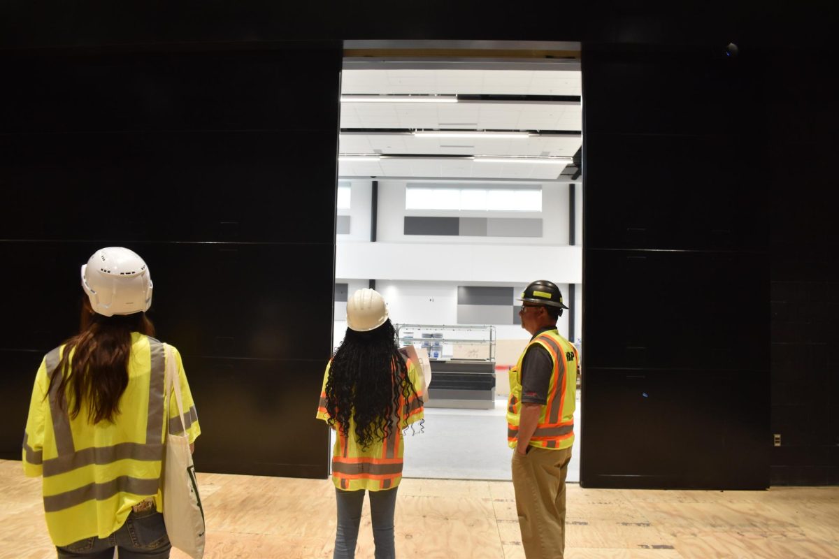 A look standing in the Black Box looking out into the cafeteria as the doors close.