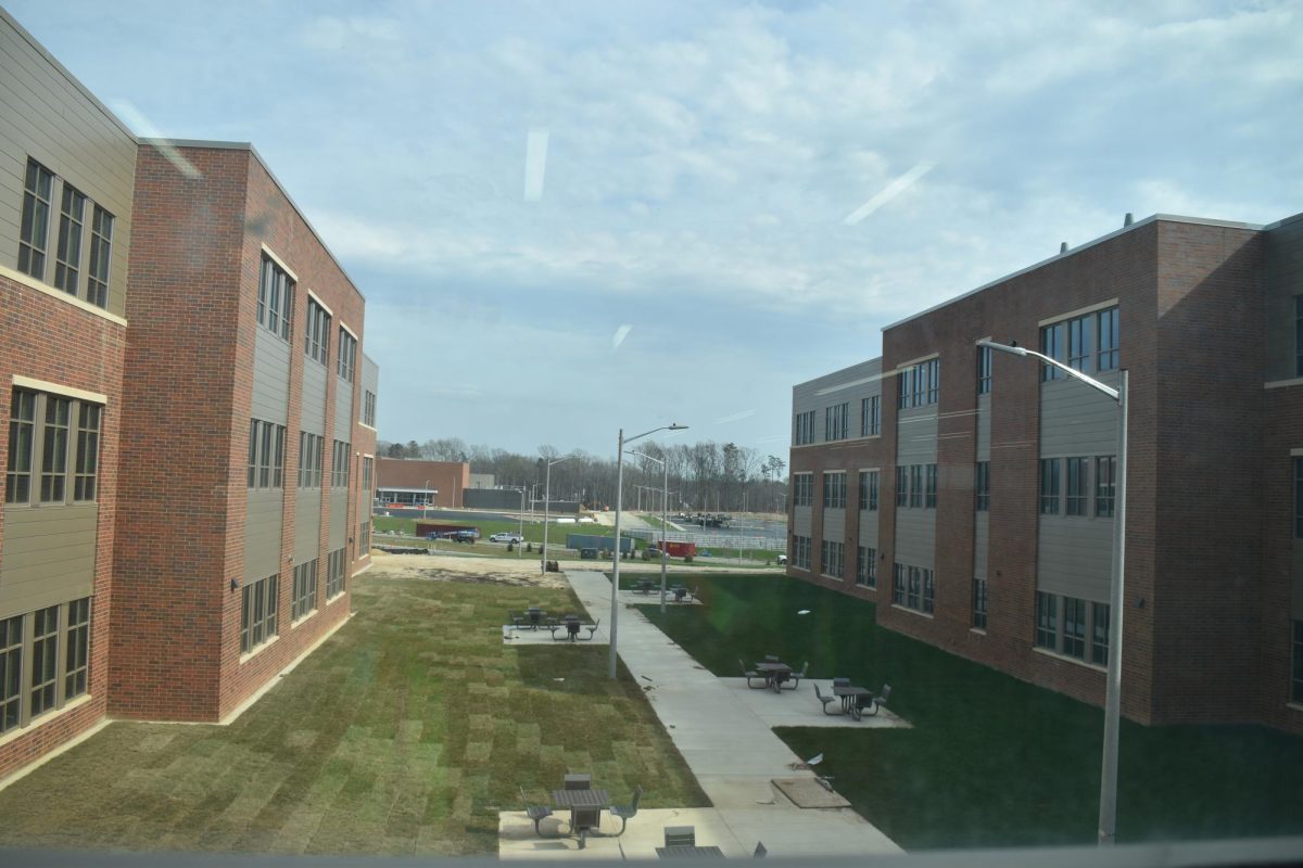 The space between left open between both building so that additions can more easily be built into the rest of the school.
